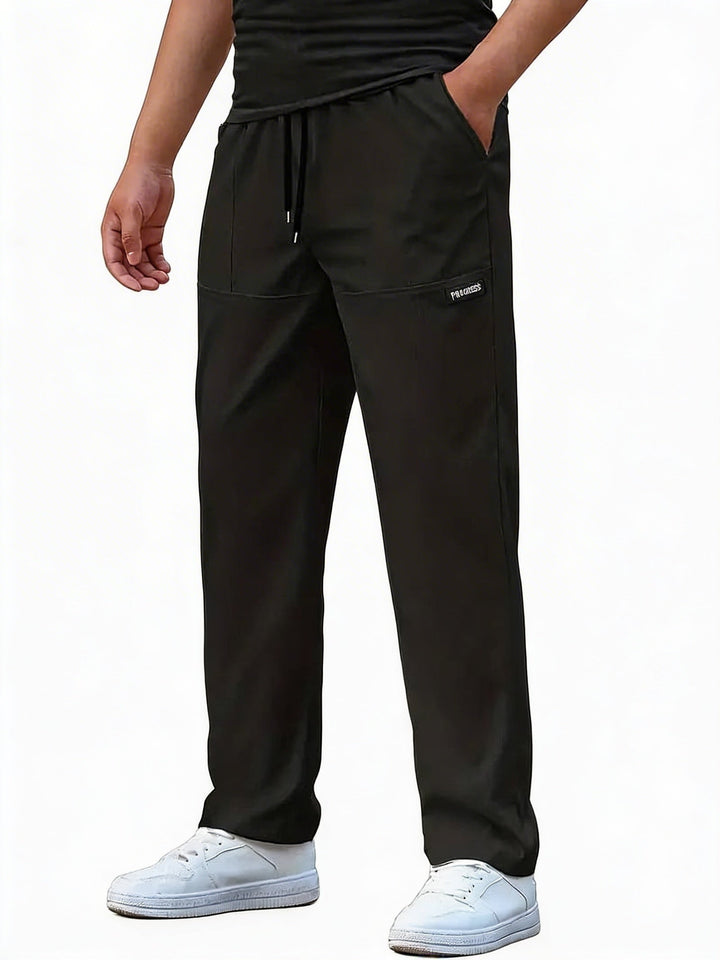 Comfortabele heren joggingbroek met rechte pijp en elastische tailleband. Ideaal voor casual en sportieve look.