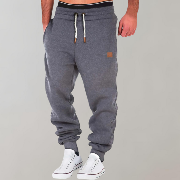 Heren sportbroek met rechte pijpen en elastische taille, een comfortabele vrijetijdsbroek voor heren.