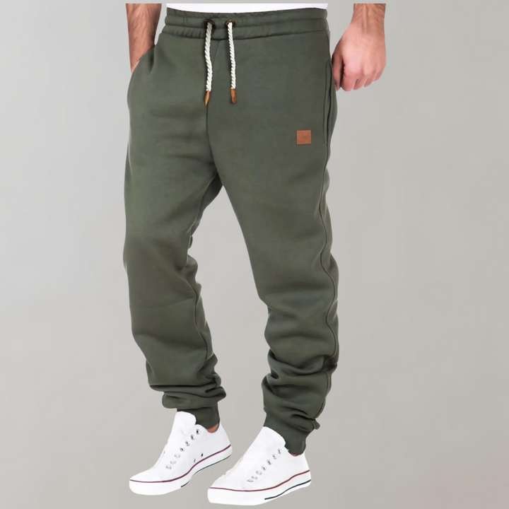 Casual heren joggingbroek met rechte pijpen, comfortabel en modieus voor diverse gelegenheden.