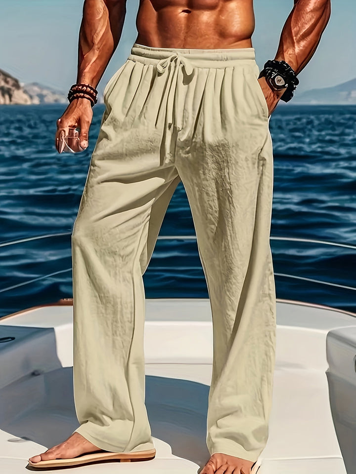 Ademende heren strandbroek van katoen-linnen met losse pasvorm en verstelbaar trekkoord. Perfect voor warme dagen.