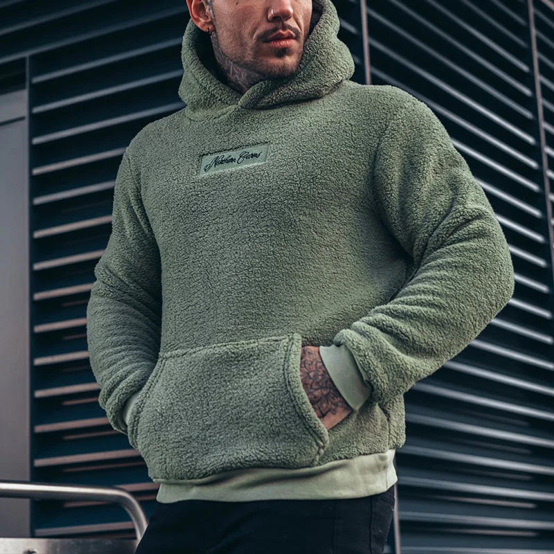 Comfortabele heren teddy hoodie met relaxte pasvorm, ideaal voor ontspanning. Zacht en warm, perfect voor alle seizoenen.