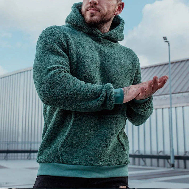 Stijlvolle heren teddy hoodie met praktische kangoeroezak en capuchon. Casual en modern voor dagelijkse stijl en comfort.
