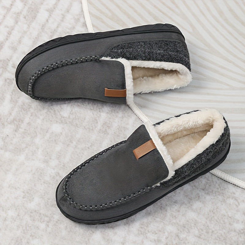 Heren pantoffels voor binnenshuis: winterwarm, met comfortabele zool en zachte voering.