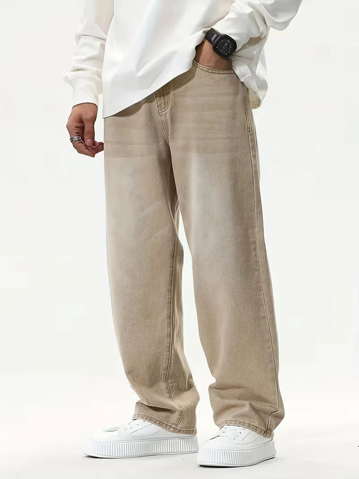 Comfortabele khaki loose fit heren jeans met wijde pijpen, ideaal voor casual en streetwear lente/zomer outfits.