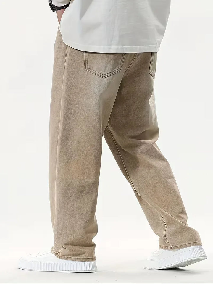 Veelzijdige khaki loose fit heren jeans met wijde pijpen, comfortabel en perfect voor zomerse casual outfits.
