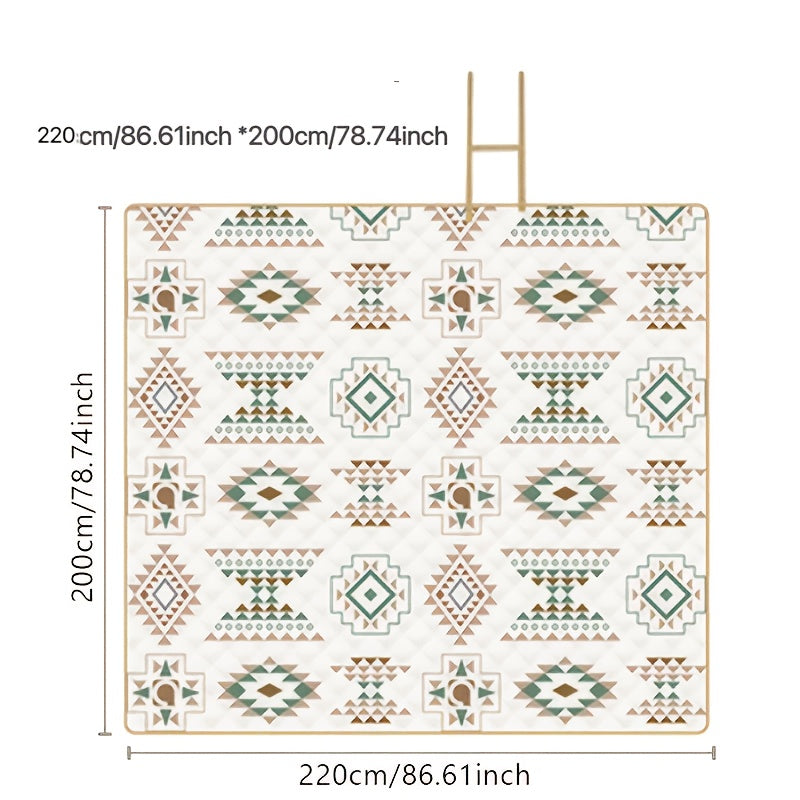 Duurzame kampeeruitrusting: opvouwbare picknickdeken bij de tent voor extra comfort buiten.