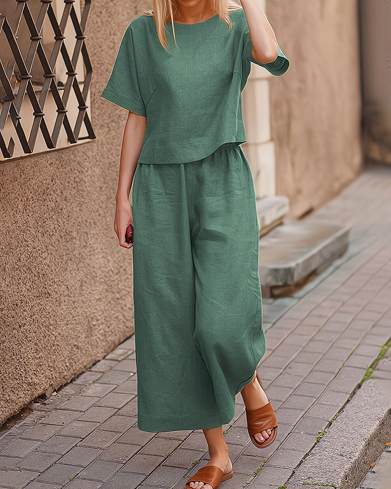 Complete dames tweedelige loungeset voor vrije tijd, met korte mouwen en comfortabele lange broek voor relaxmomenten.