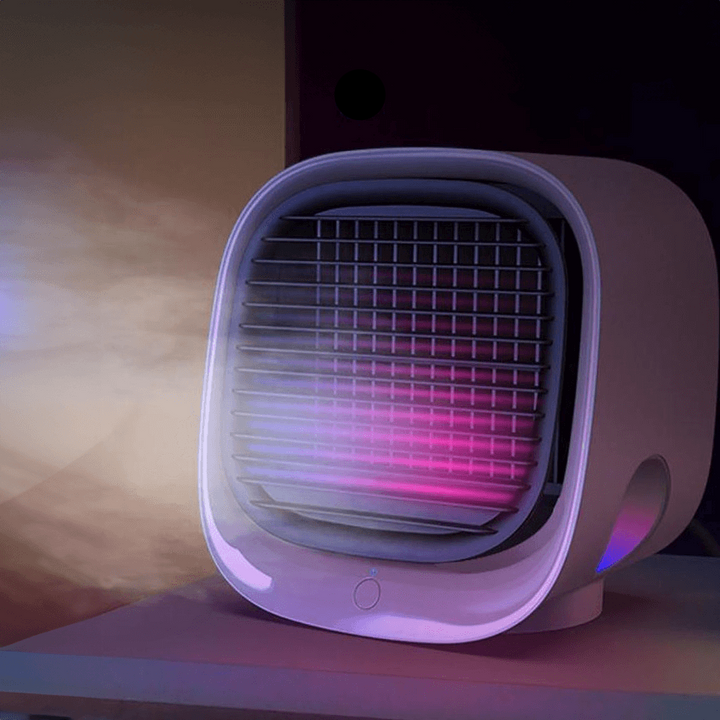 Roze compacte persoonlijke koeler met USB-voeding, perfect voor slaapkamer of kantoor. Draagbare ventilator bevochtiger.