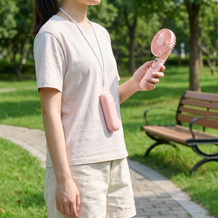 Compacte draagbare ventilator met 3 functies voor unisex gebruik. Ideaal voor reizen, zomer en buitenleven.