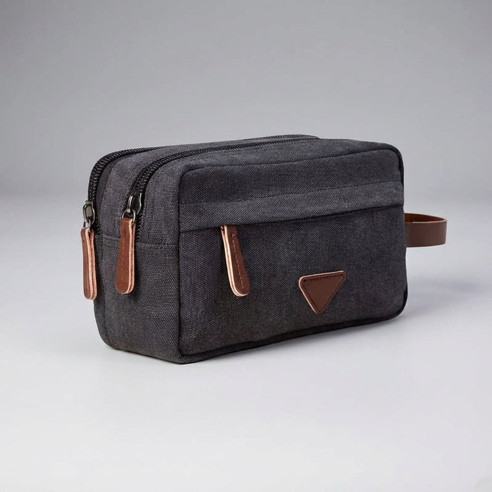 Duurzame canvas toilettas Tripelle, waterdicht en compact, perfect voor al je reisbenodigdheden.