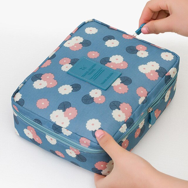 Veelzijdige waterdichte make-up tas, compacte cosmetica organizer voor dames op reis.