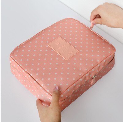Duurzame waterdichte toilettas dames, compact design voor make-up en cosmetica op reis.