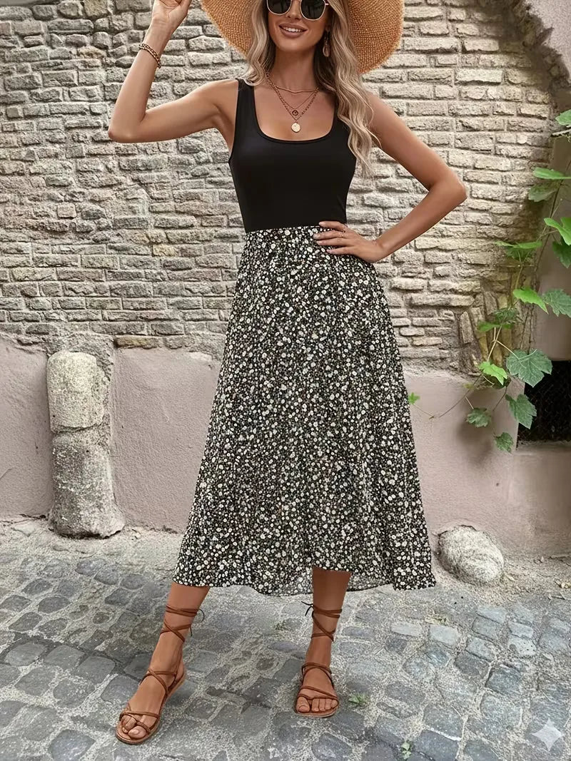 Perfecte zomerjurk dames, A-lijn model met prachtige bloemenprint, modieus en mouwloos.