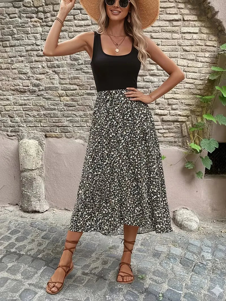Perfecte zomerjurk dames, A-lijn model met prachtige bloemenprint, modieus en mouwloos.