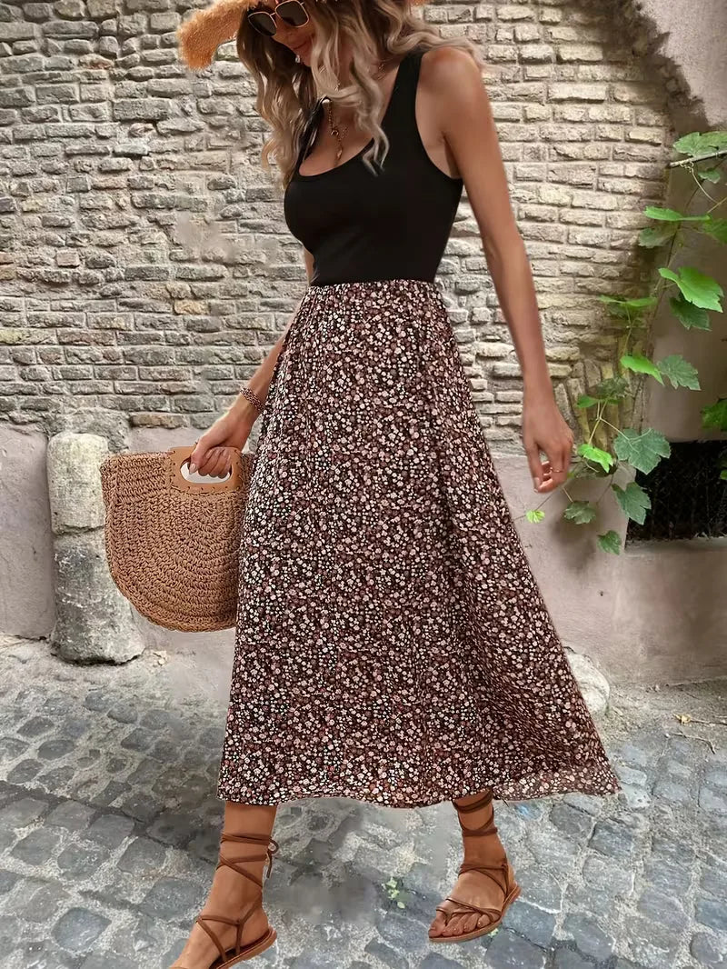 Zomerse damesjurk met bloemenprint, A-lijn model, perfect voor vakantie en vrije tijd.