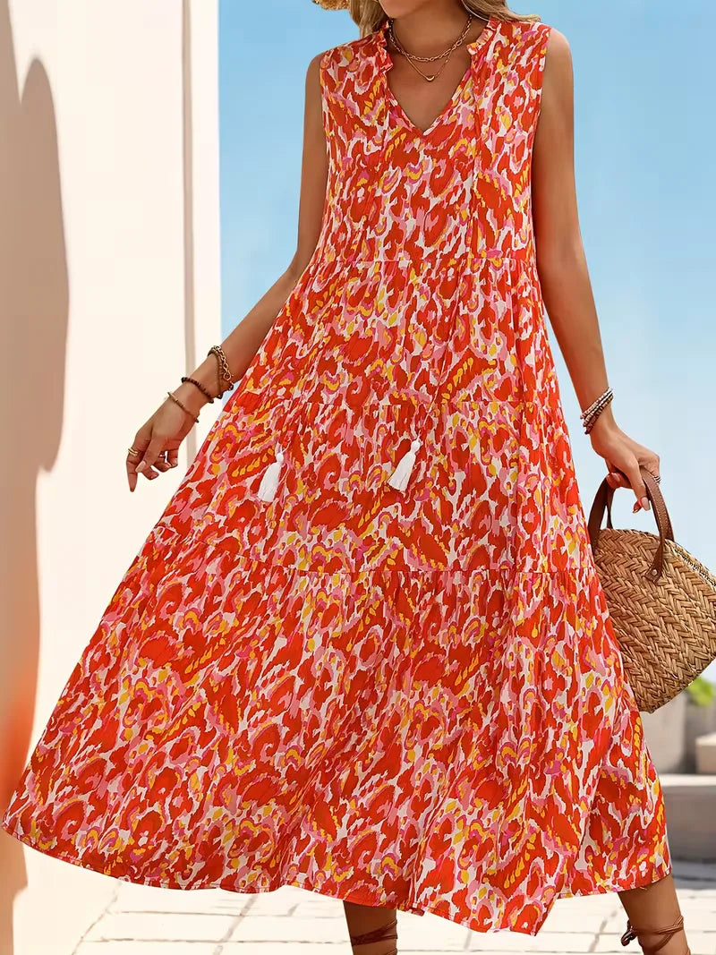 Trendy bohemian zomerjurk voor dames, A-lijn model, V-hals en vrolijke speelse kwastjes.