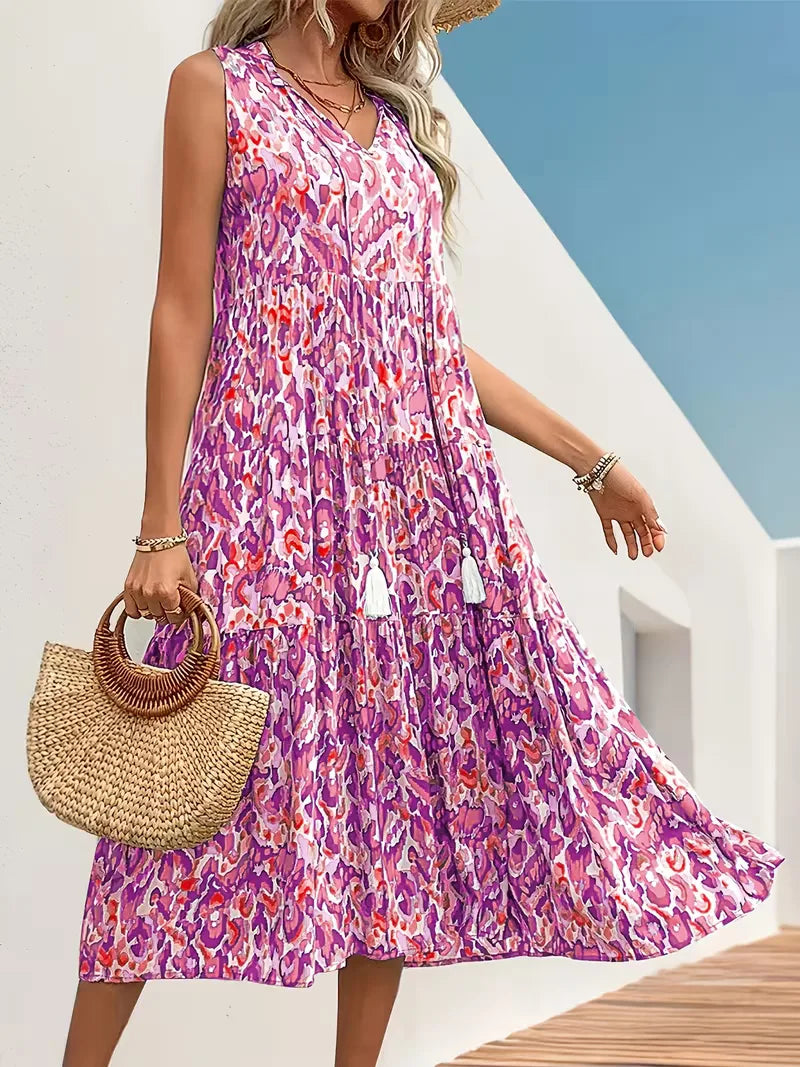 Bohemian zomer A-lijn jurk met V-hals, mouwloos en vrolijke kwastjes voor dames.