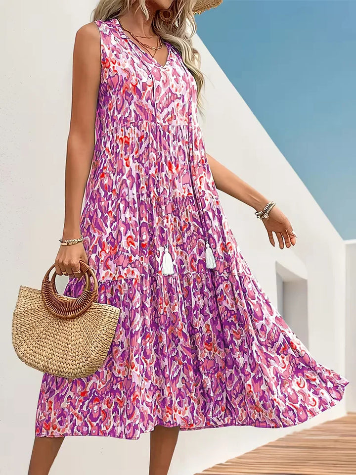 Bohemian zomer A-lijn jurk met V-hals, mouwloos en vrolijke kwastjes voor dames.