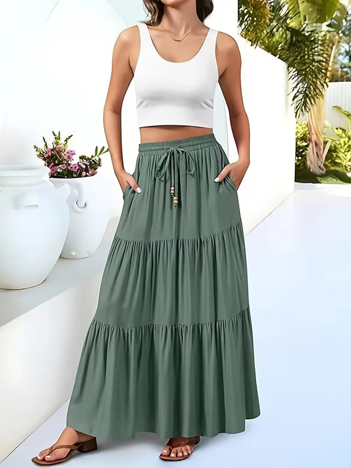 Trendy A-lijn maxi rok voor dames met hoge taille, een must-have voor een bohemian zomerstijl.