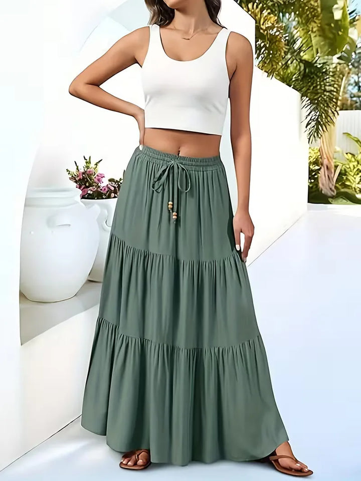 Flatterende A-lijn maxi rok met hoge taille voor dames, comfortabel en modieus.