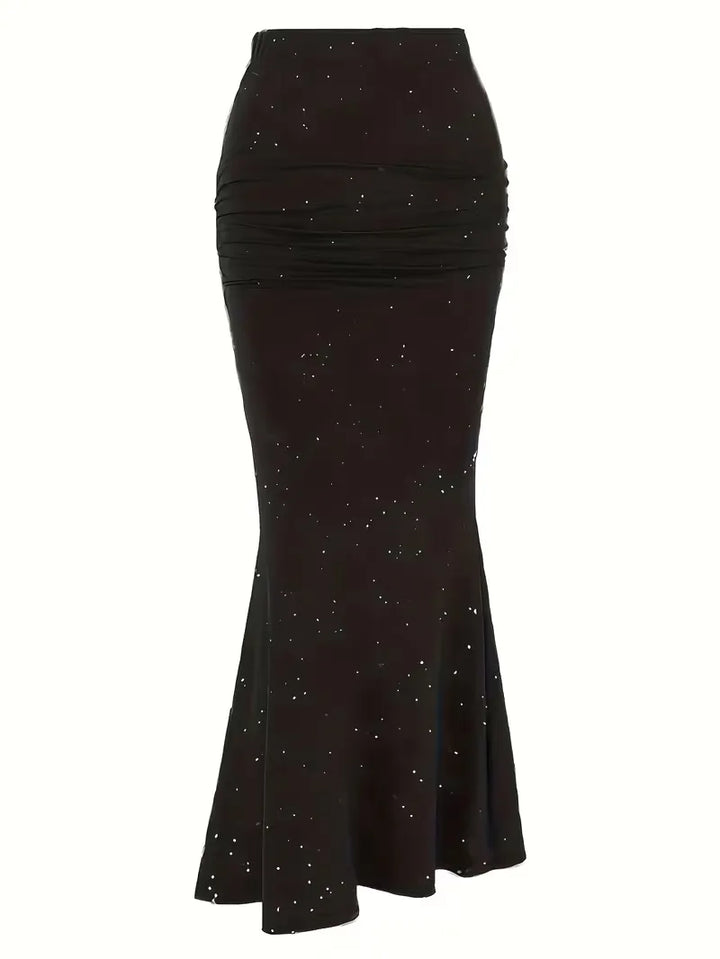 Comfortabele dames A-lijn midirok in zwart met unieke subtiele spikkels, hoge taille. Geschikt voor lente/zomer.