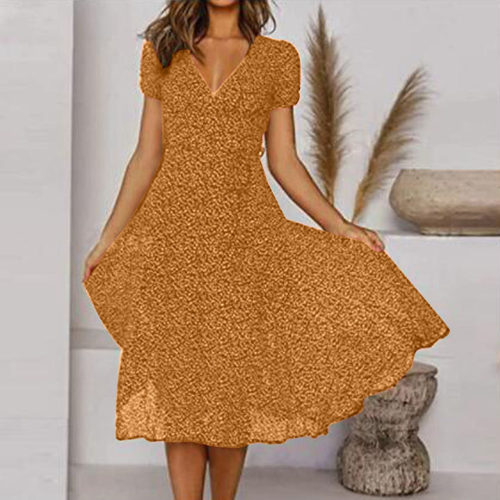 Casual dames a-lijn jurk met v-hals en bloemenprint, perfect voor warme dagen.