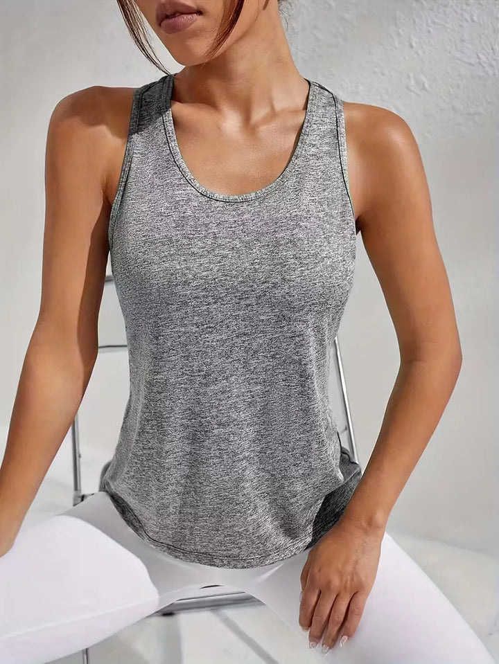 Activewear dames: ademende racerback sporttop, comfortabel en duurzaam voor elke dag.