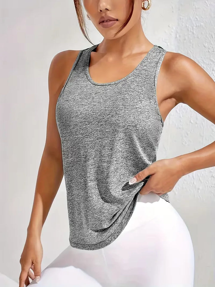 Dames trainingskleding: ademende sporttop met racerback, essentieel voor je workout.