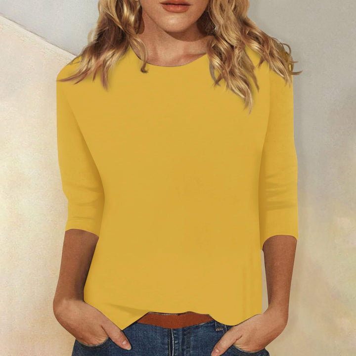 Modieuze, comfortabele damestop met 3/4 mouwen en ronde hals, veelzijdig voor casual kleding.