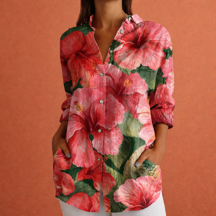 Dames bedrukte blouse met klassieke kraag, lange mouwen en knoopsluiting. Elegant en comfortabel voor modebewuste vrouwen.