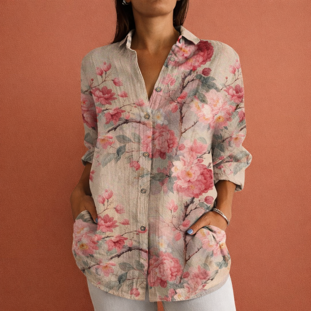 Comfortabele damesblouse met lange mouwen, levendige bloemenprint en klassieke kraag. Perfect voor een chique look.