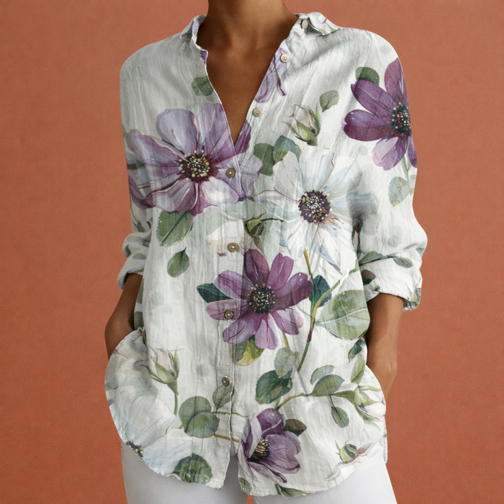 Hoogwaardige damesblouse met elegante print, klassieke kraag en knoopsluiting. Stijlvol, comfortabel en duurzaam.