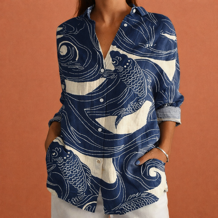 Stijlvolle damesblouse met levendige bloemenprint en klassieke kraag. Perfect voor lente en zomer. Comfortabel en trendy.