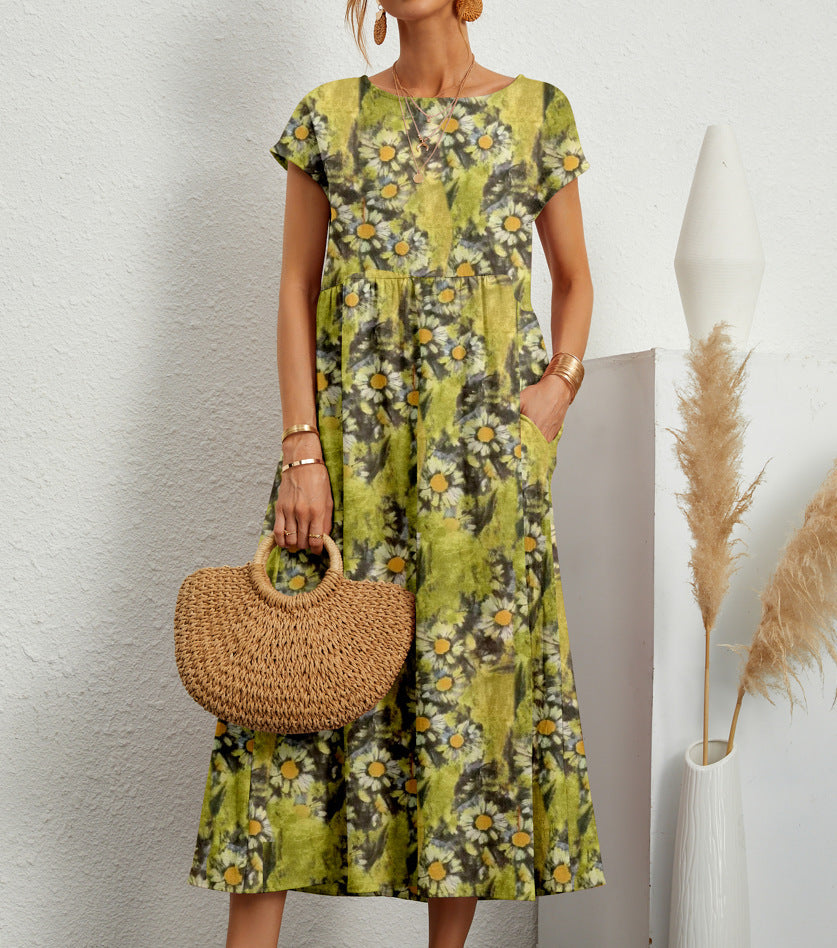 Comfortabele casual midi jurk met vrolijke bloemenprint en zakken, perfect als zomer- of strandjurk.