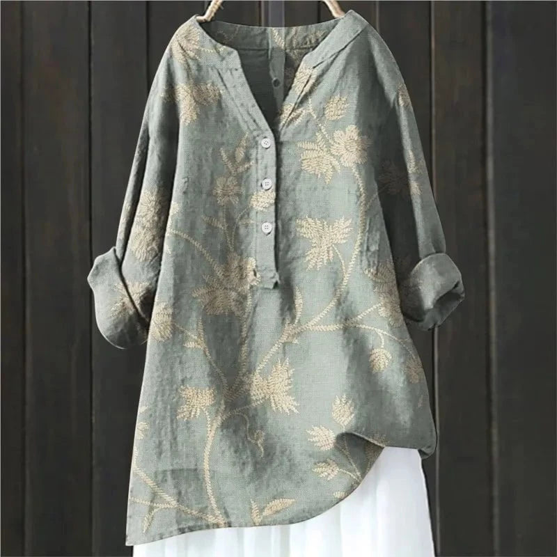 Casualchique damesblouse met bloemenprint, diepe V-hals en comfortabele lange mouwen.