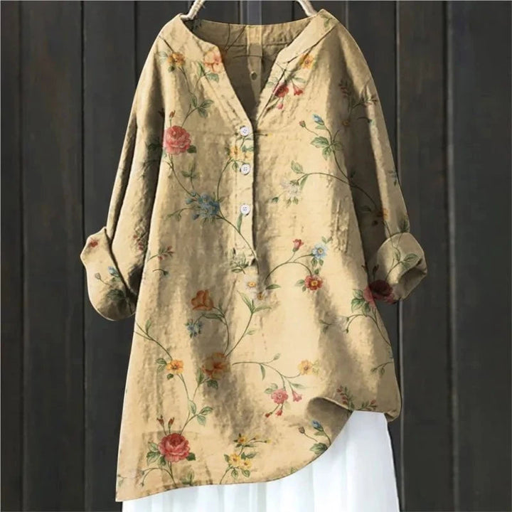 Elegante damesblouse met bloemenprint en stijlvolle V-hals, ideaal voor lente- of zomeroutfits.