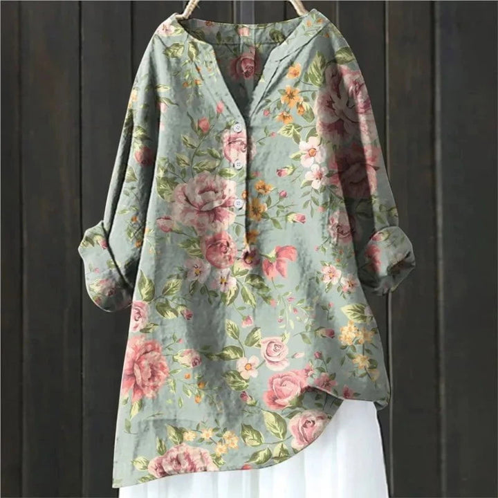 Veelzijdige bloemenprint blouse voor dames met V-hals en lange mouwen, geschikt voor casual en chique momenten.