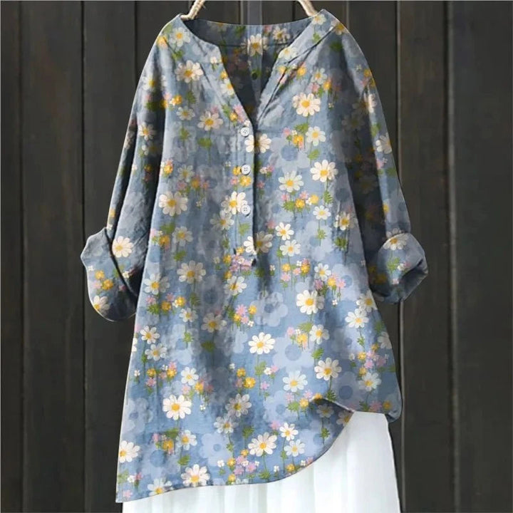 Levendige bloemenprint blouse voor dames met trendy V-hals en lange mouwen, perfect voor de zomer.