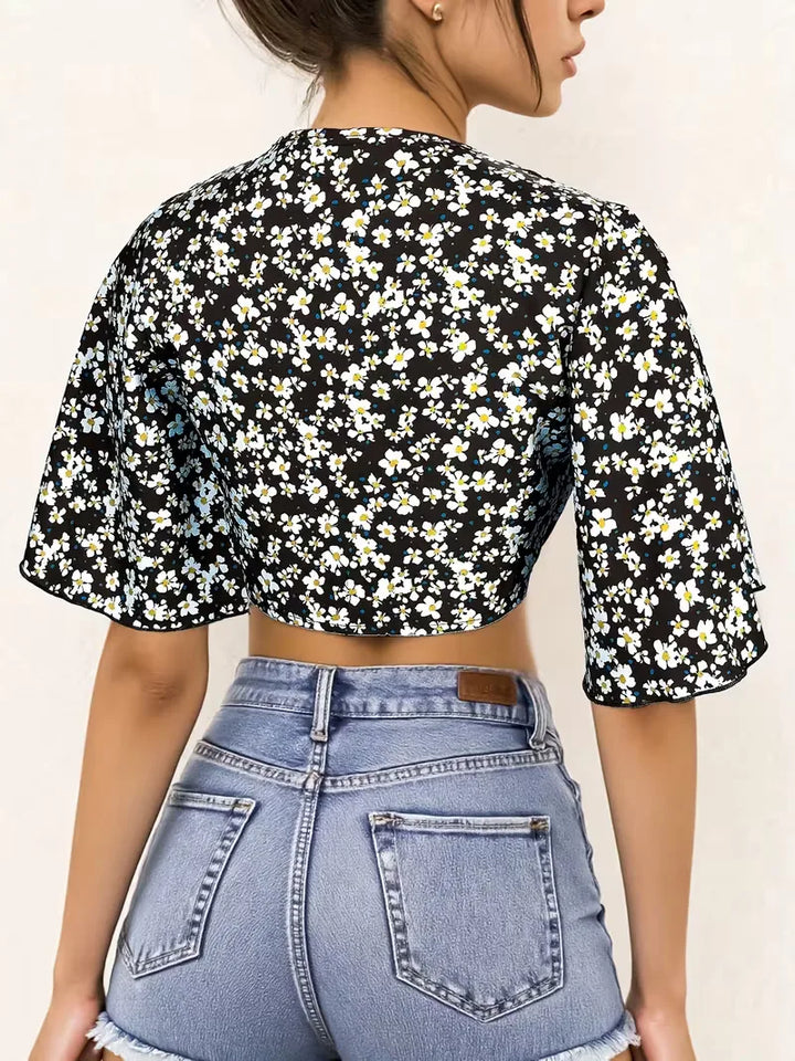 Dames korte mouwen bloemenprint crop top met tie-front, geschikt voor zomer en vrije tijd.