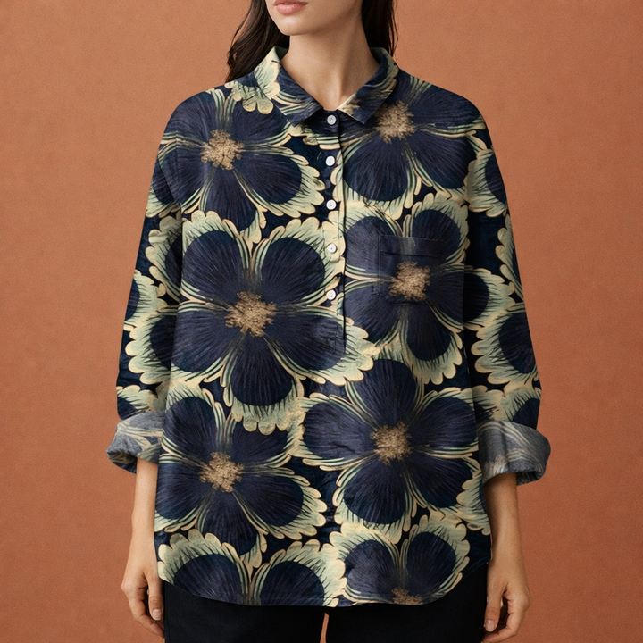 Elegante dames blouse met kleurrijke bloemenprint en lange mouwen. Veelzijdig en comfortabel.