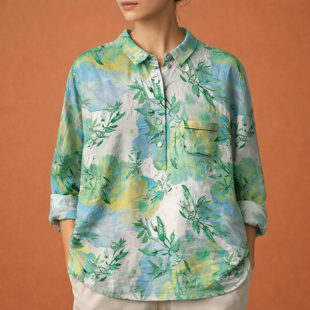 Lente/zomer damesblouse met bloemenprint en lange mouwen. Frisse look, veelzijdig te dragen.