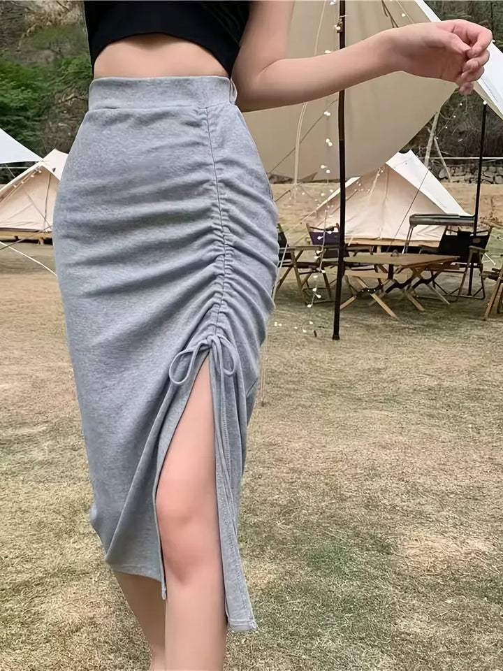 Zwarte dames bodycon midi rok, hoge taille, split. Comfortabel en elegant voor elke gelegenheid.