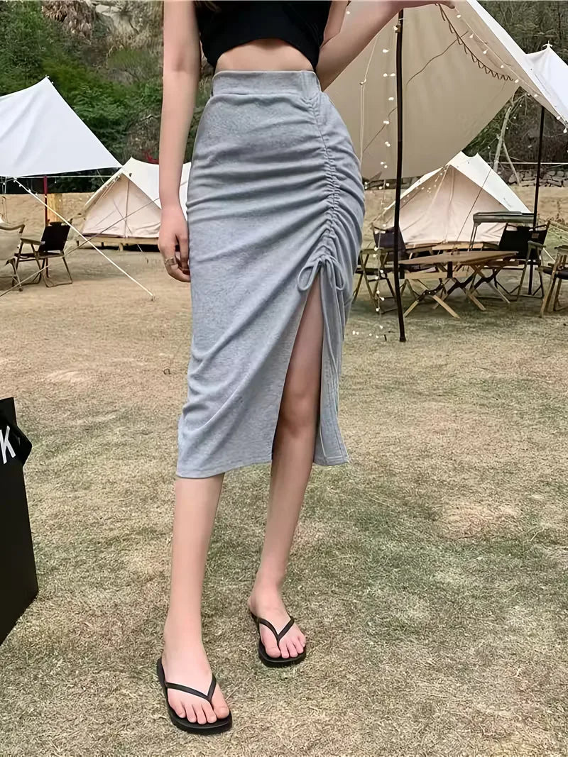 Veelzijdige dames bodycon midi rok met hoge taille en split; elegant voor werk, stijlvol voor vrije tijd.