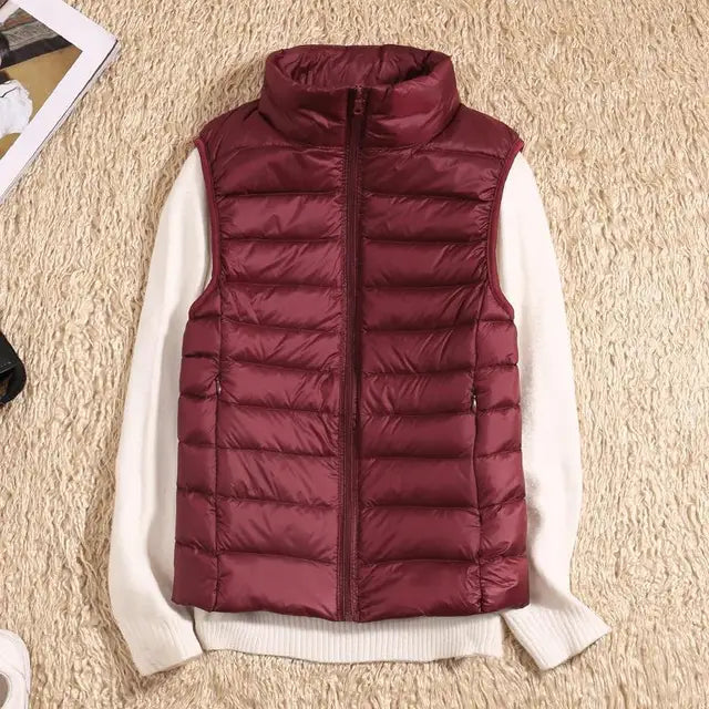 Vrouwelijke bodywarmer, sportief en comfortabel, ideaal voor buitenwandelingen en casual stijl.