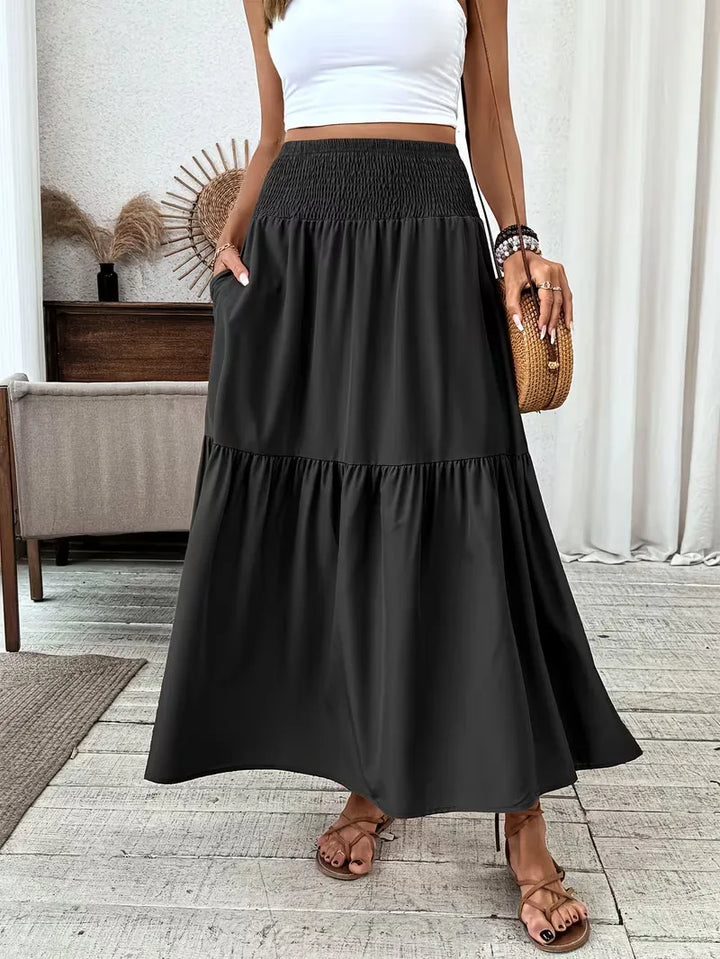 Gelaagde bohemian A-lijn maxi rok met elastische smock taille, comfortabele dames zomer kleding.