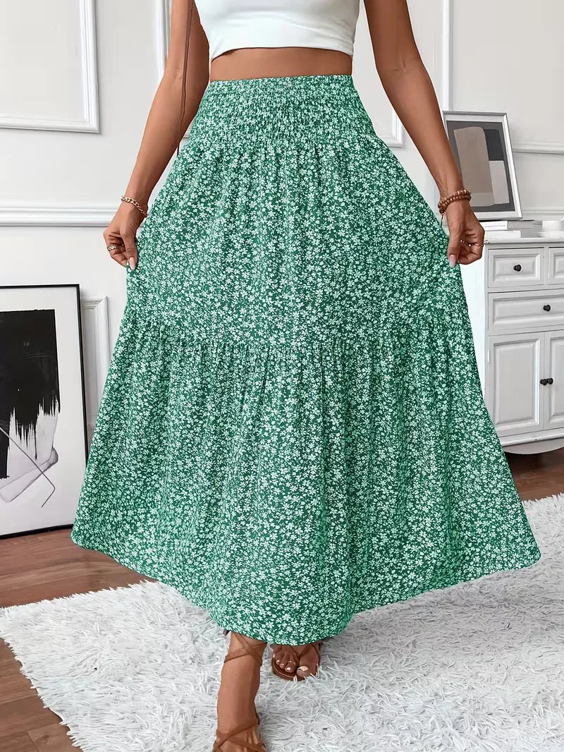 Stijlvolle dames A-lijn maxi rok met bohemian print, gelaagd design en elastische smock taille.
