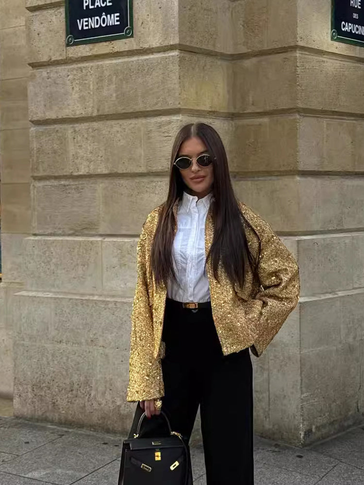 Modieus dames bomberjack, versierd met schitterende gouden pailletten, voor een glamoureuze uitstraling.