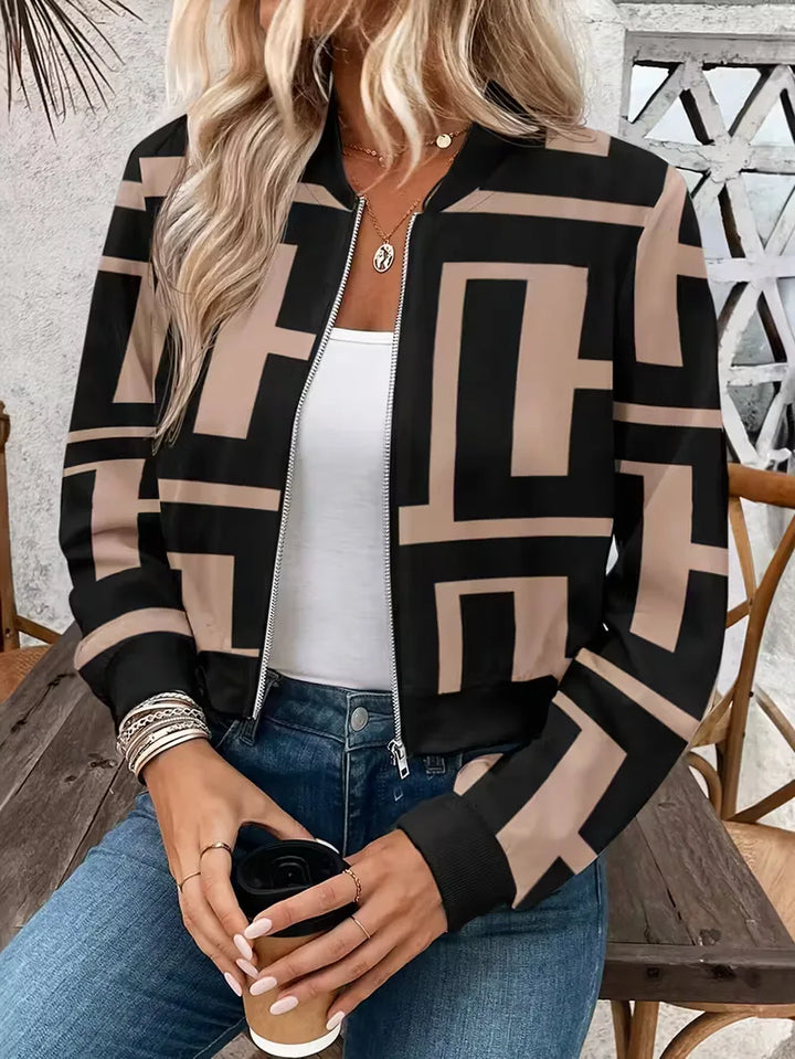Dames bomberjack met opvallende geometrische print. Ideale casual streetwear lente/herfst jas van polyester met ritssluiting.