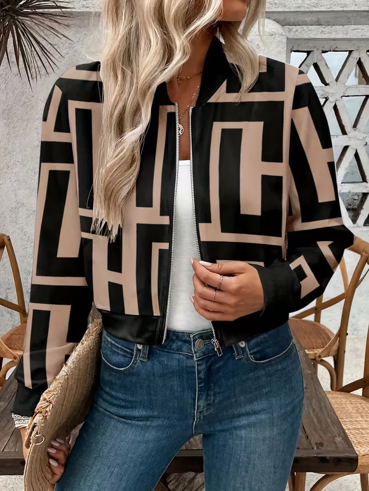 Modieus dames bomberjack met geometrische print; veelzijdig voor casual lente/herfst streetwear. Duurzaam polyester en rits.