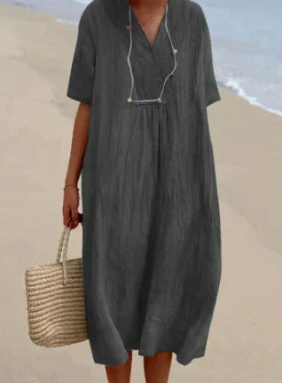 Modieuze midi zomerjurk voor vrouwen, een casual, doch stijlvolle keuze voor warme dagen.